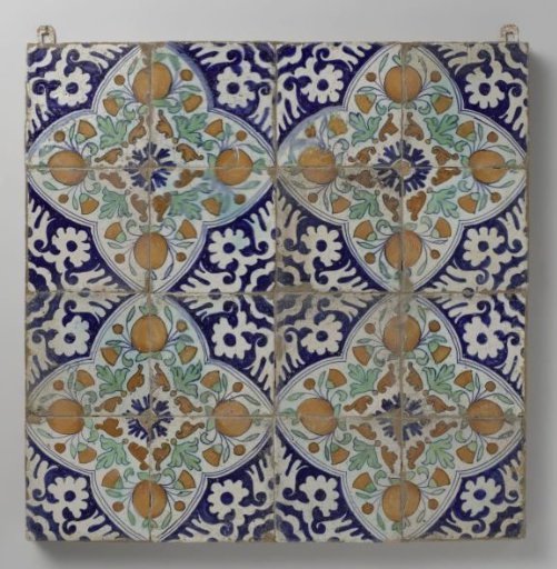 Panel of sixteen tiles with pomegranates and marigolds in four quatrefoils
