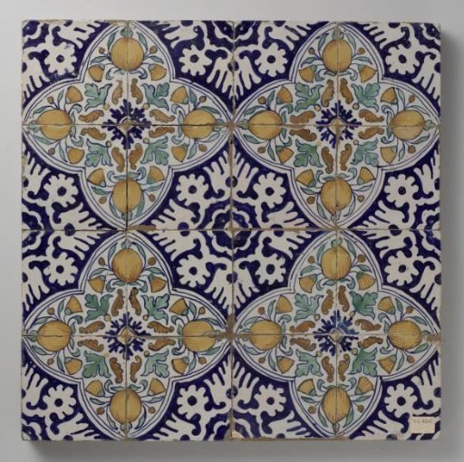 Panel of sixteen tiles with pomegranates and marigolds in four quatrefoils