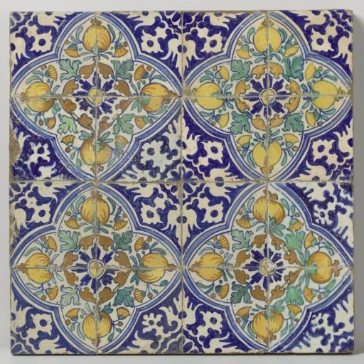 Panel of sixteen tiles with marigolds and pomegranates in four quatrefoils