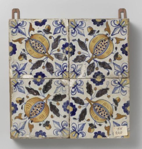 Panel of four tiles with pomegranates