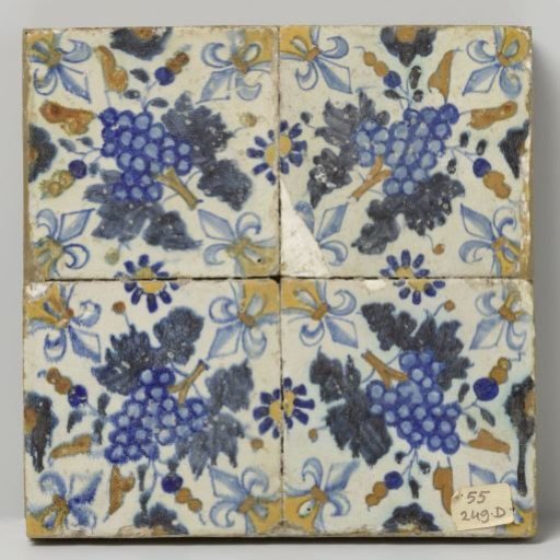 Panel of four tiles with bunches of grapes