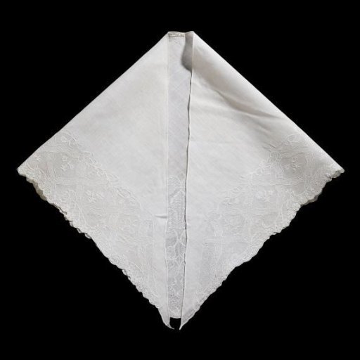Fichu of linen batiste, triangular and scalloped, decorated with a broad border of squares containing a straw bouquet in tambour work, shading work and needle lace
