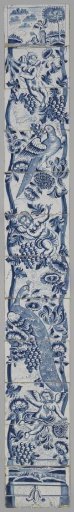 Tile tableau with a fluted column painted in blue, around which are draped flowers, grape clusters, a peacock, a parrot, and three putti, with Tobias and the Angel at the top