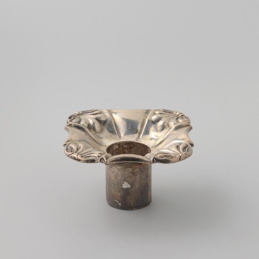 Fat catcher belonging to a candelabrum