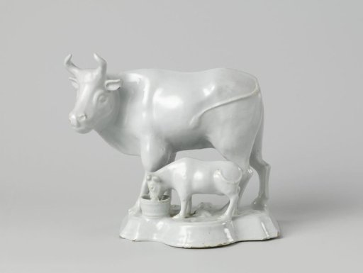 Cow and Calf with a Tub and a Pedestal with Leafwork and Frogs in Relief