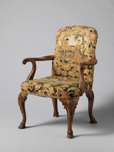 Armchair of walnut with upholstery of gros and petitpoint.