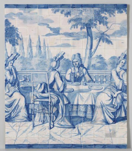 Group of three women and a man at a table on a terrace
