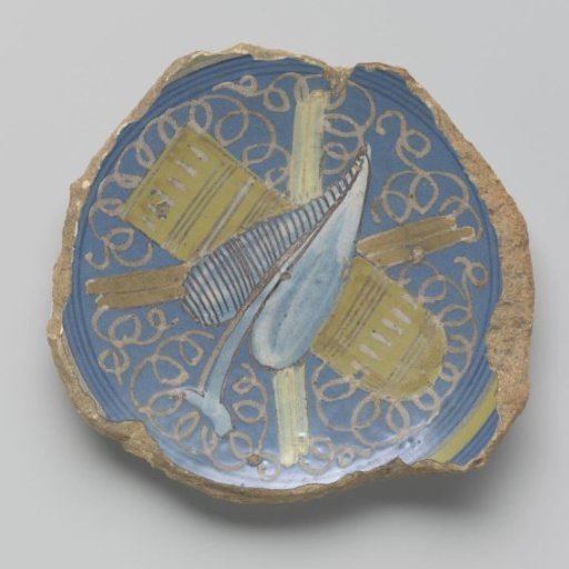 Fragment of a dish with Taoist symbols