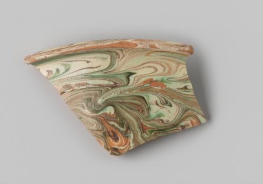 Bowl, fragment of the rim, decorated with slip layers.