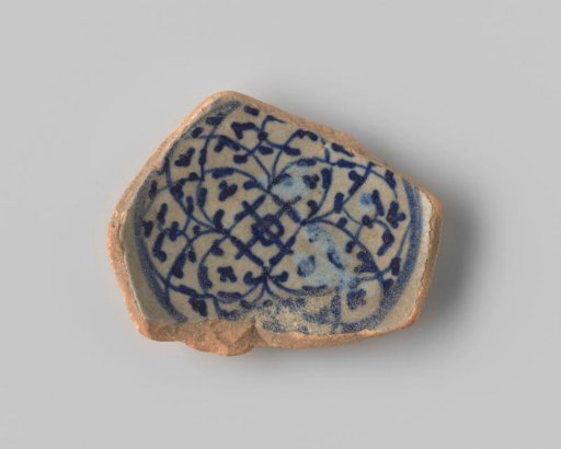 Bowl, fragment of which the front is decorated with a scroll ornament within a circle