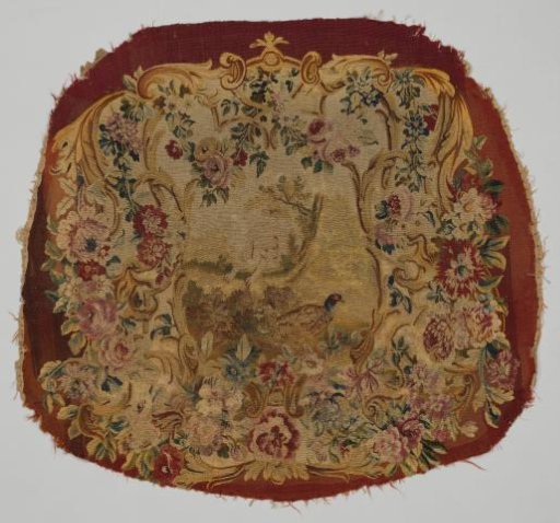 Chair seat with dog and pheasant surrounded by rocailles and floral garlands