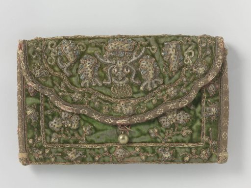 Letter bag in an envelope-shaped model of green velvet, embroidered with a mask-like face on the front and a fantasy animal on the back