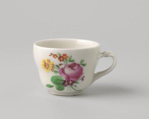 Cup with a bouquet and flower sprays