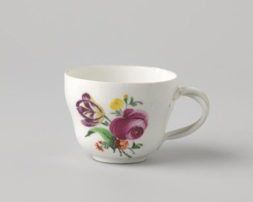 Cup with a bouquet and flower sprays