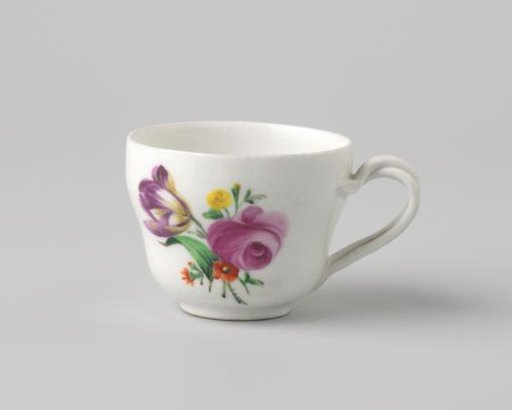 Cup with a bouquet and flower sprays