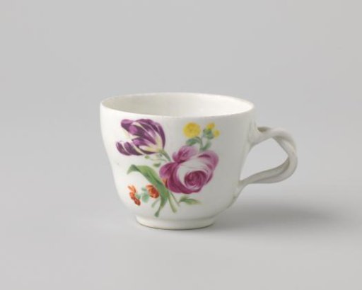 Cup with a bouquet and flower sprays