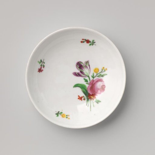 Saucer with a bouquet and flower sprays
