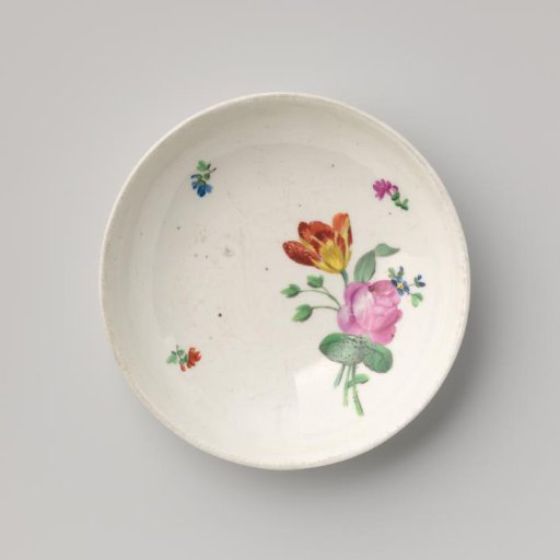 Saucer with a bouquet and flower sprays