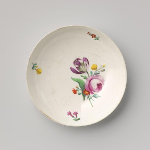 Saucer with a bouquet and flower sprays