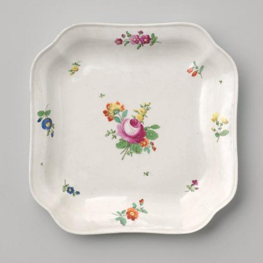 Dish with a bouquet and flower sprays