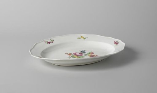 Dish with a bouquet and flower sprays