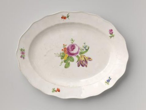 Dish with a bouquet and flower sprays