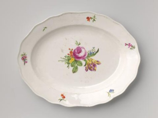 Dish with a bouquet and flower sprays