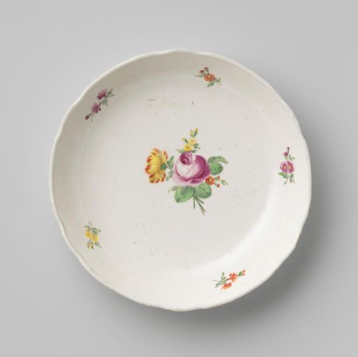 Dish with a bouquet and flower sprays