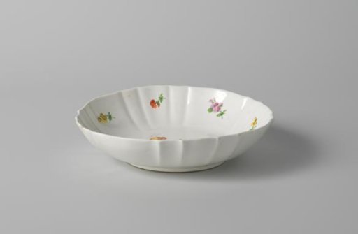 Dish with a bouquet and flower sprays