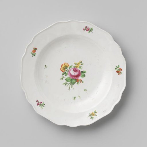 Plate with a bouquet and flower sprays