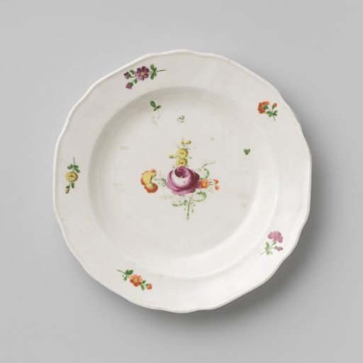 Plate with a bouquet and flower sprays