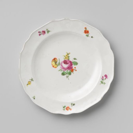 Plate with a bouquet and flower sprays