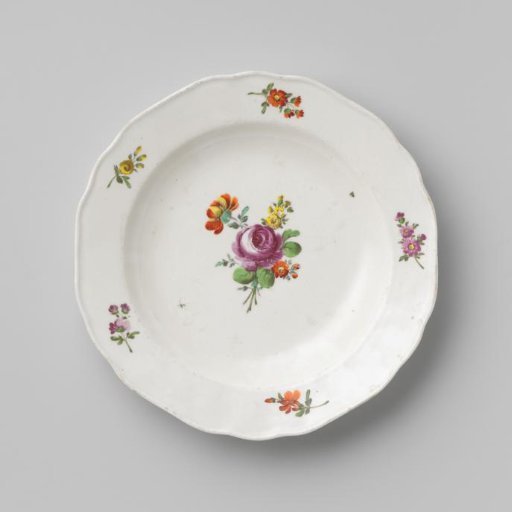 Plate with a bouquet and flower sprays