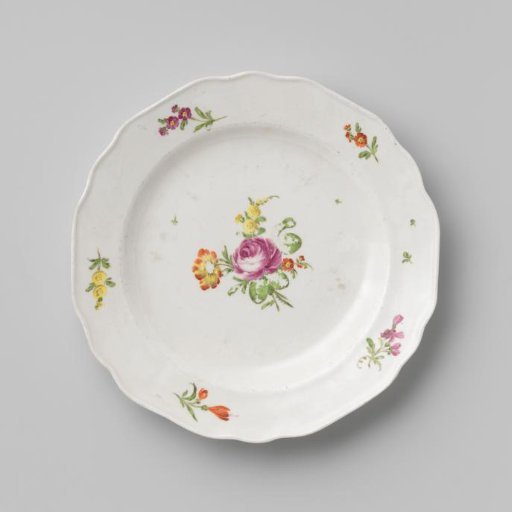 Plate with a bouquet and flower sprays