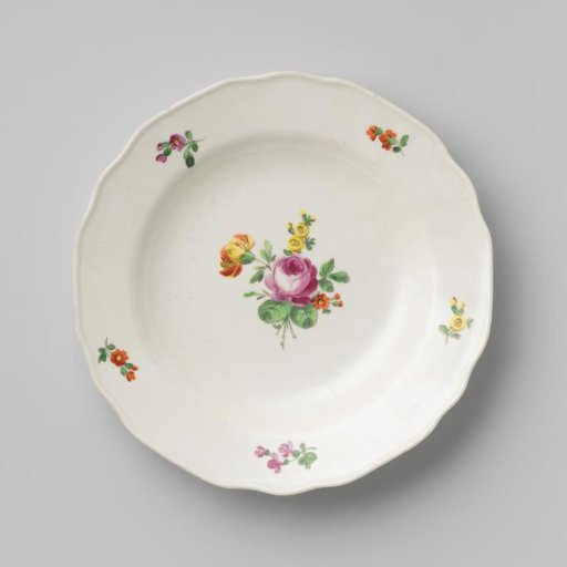 Plate with a bouquet and flower sprays