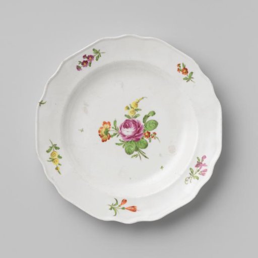 Plate with a bouquet and flower sprays