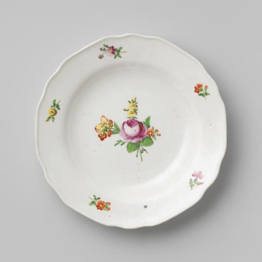 Plate with a bouquet and flower sprays
