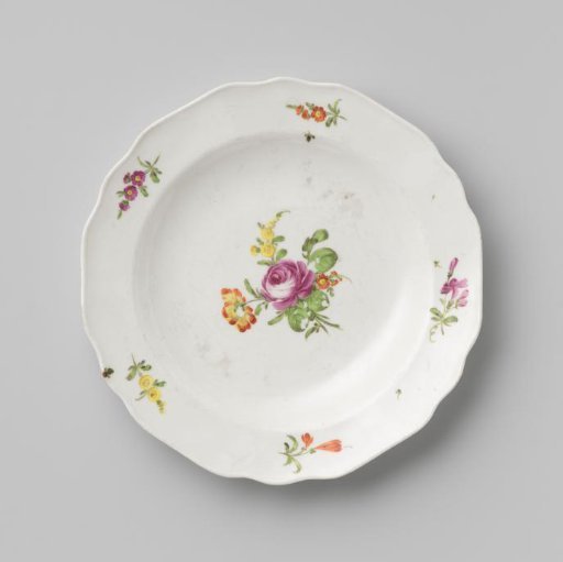 Plate with a bouquet and flower sprays