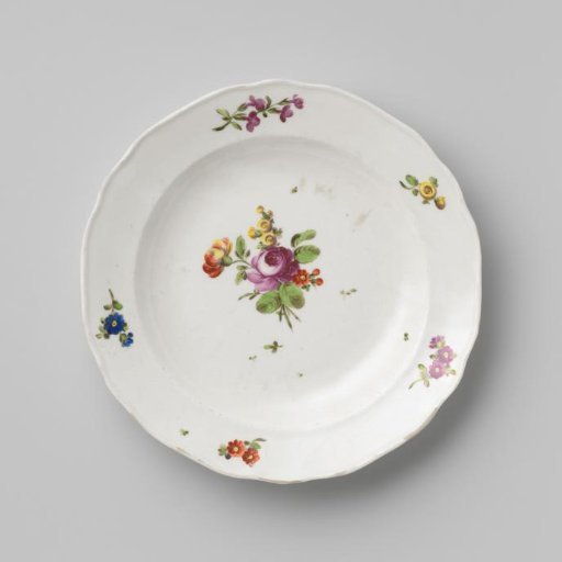 Plate with a bouquet and flower sprays