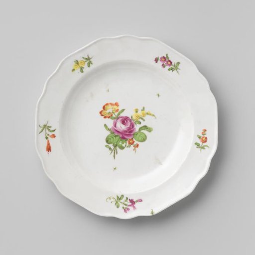Plate with a bouquet and flower sprays