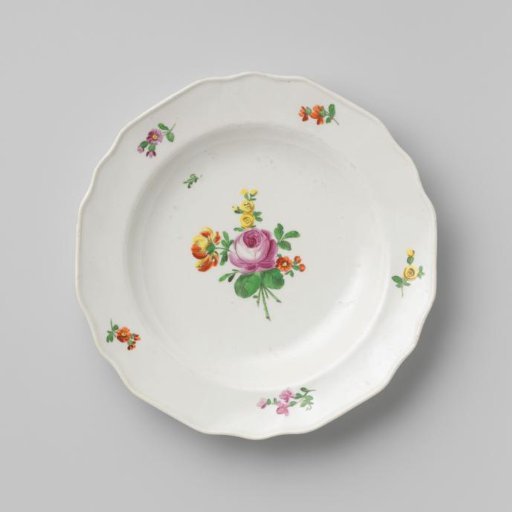 Plate with a bouquet and flower sprays