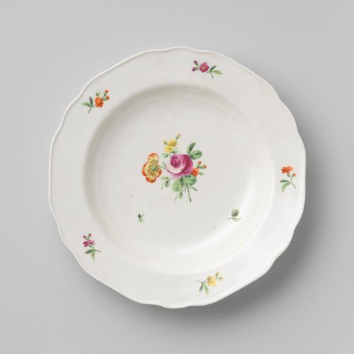 Plate with a bouquet and flower sprays