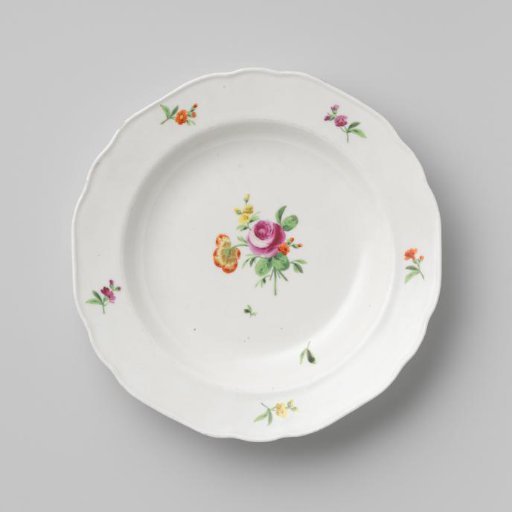 Plate with a bouquet and flower sprays