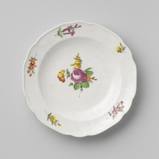 Plate with a bouquet and flower sprays
