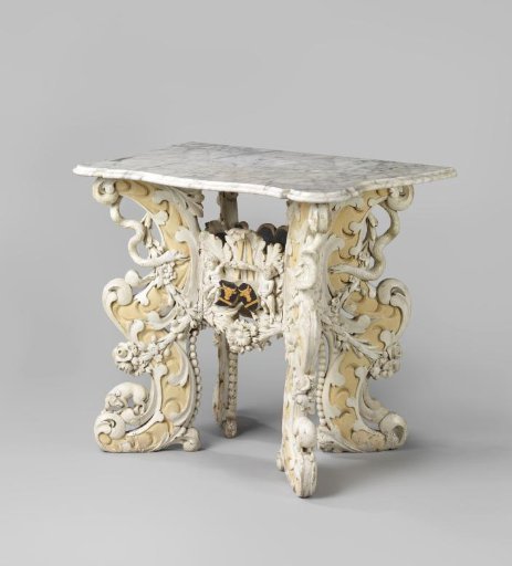 Table of white-painted wood with four legs placed diagonally and decorated with carving