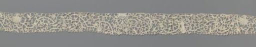 Strip of needle lace with birds, lions and dogs