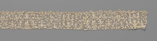 Strip of needle lace with numerous four-footed animals and birds