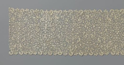 Strip of needle lace for a superplis with rosette flowers and C-shapes