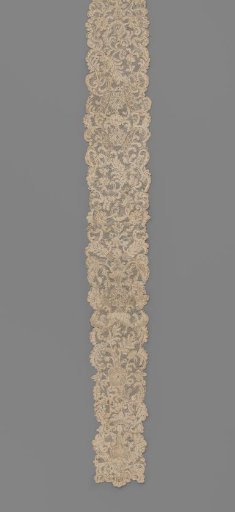 Two sewn-together chin flaps of needle lace or Burano lace