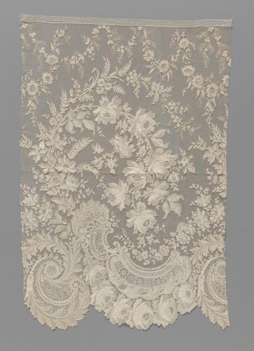 Strip of needle lace with richly decorated C-scrolls and a bent flower branch full of roses and forget-me-nots